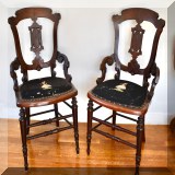 F17. Pair of Eastlake style chairs with needlepoint seat. Wear to upholstery. 37”h x 20”w x 19”d - $150 